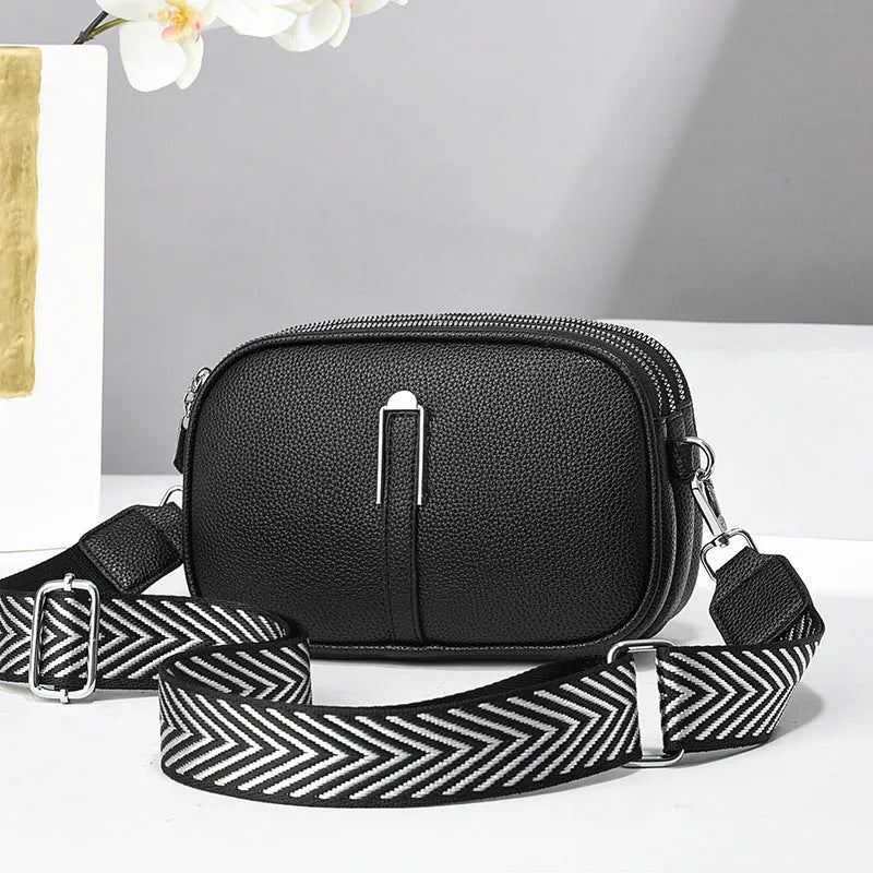 Soft PU leather crossbody bag in khaki colour with multiple compartments and stone pattern detail
