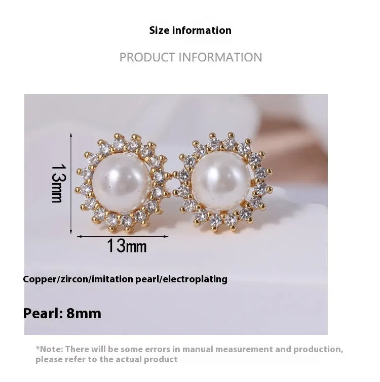 Copper flower earrings with electroplated gold finish featuring petal design, on neutral background