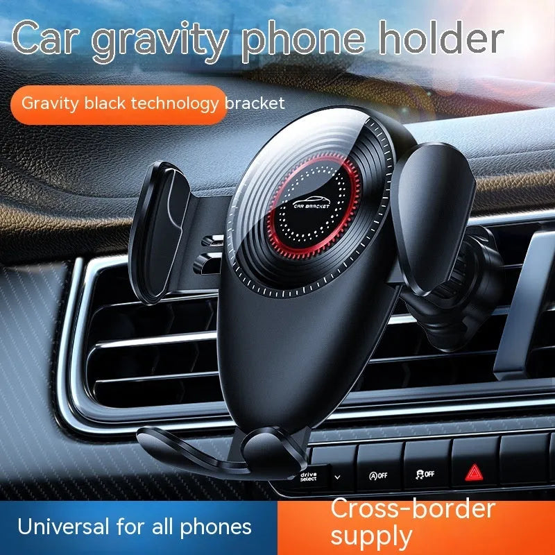 Black universal car mobile phone bracket attached to a car air vent