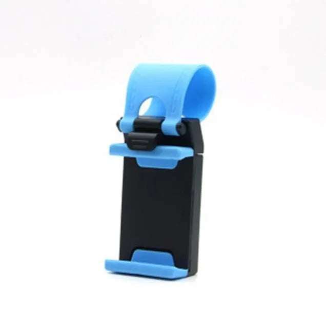 Black universal steering wheel phone clip holder with silicone pad mounted on a car steering wheel.
