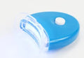LED teeth whitening kit with wide edge tray and buckle denture system, available in blue, white, or red
