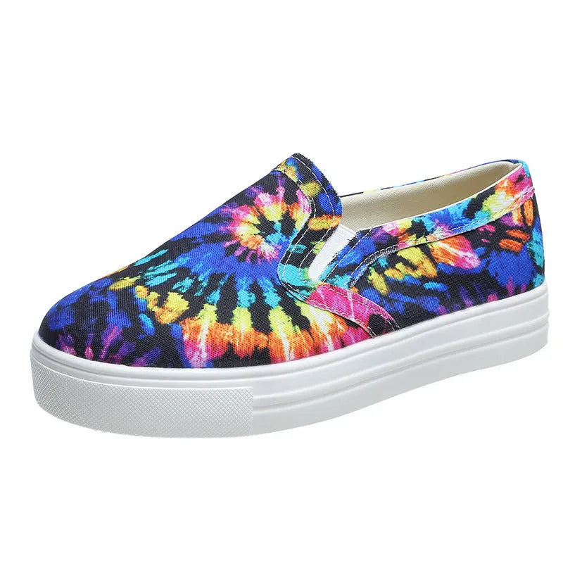 Women's casual flat-bottom canvas sneakers in multiple colours on a white background
