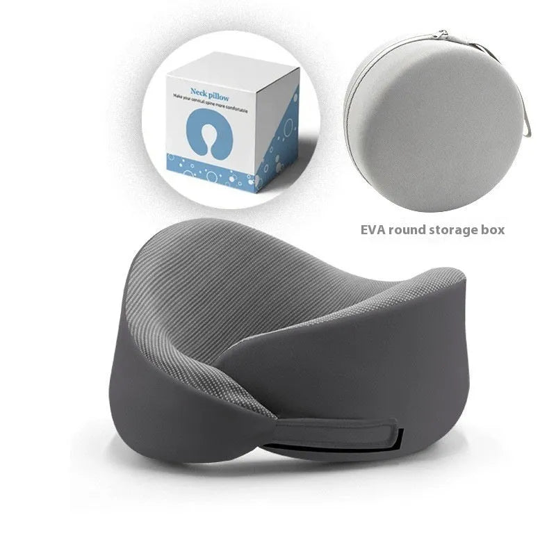 Light grey memory foam U-shaped neck pillow with a removable magnetic cloth cover