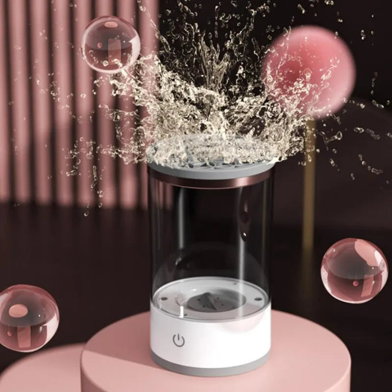 Grey and white electric makeup brush cleaning device with USB charging port