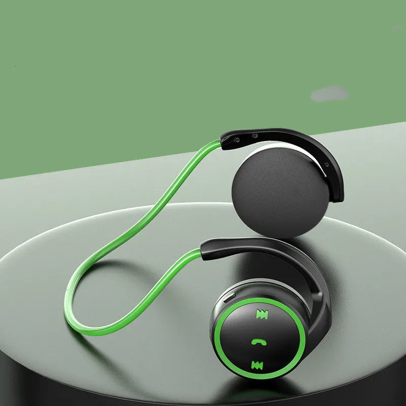 On-ear wireless sports Bluetooth headset in black with earring-style design, sponge ear caps and charging cable