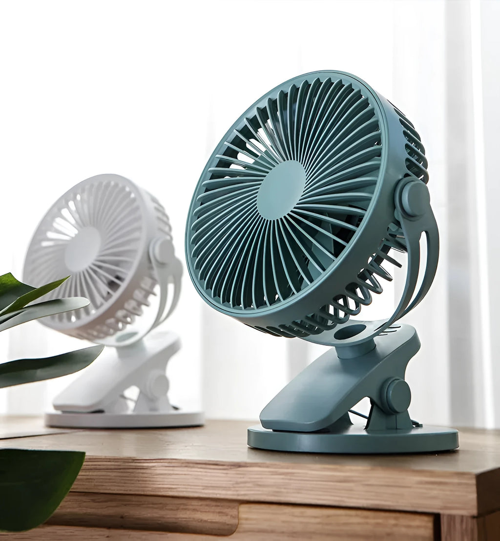 USB mini clip fan in green, with 135mm blade, clipped to a desk edge, showing USB cable connection