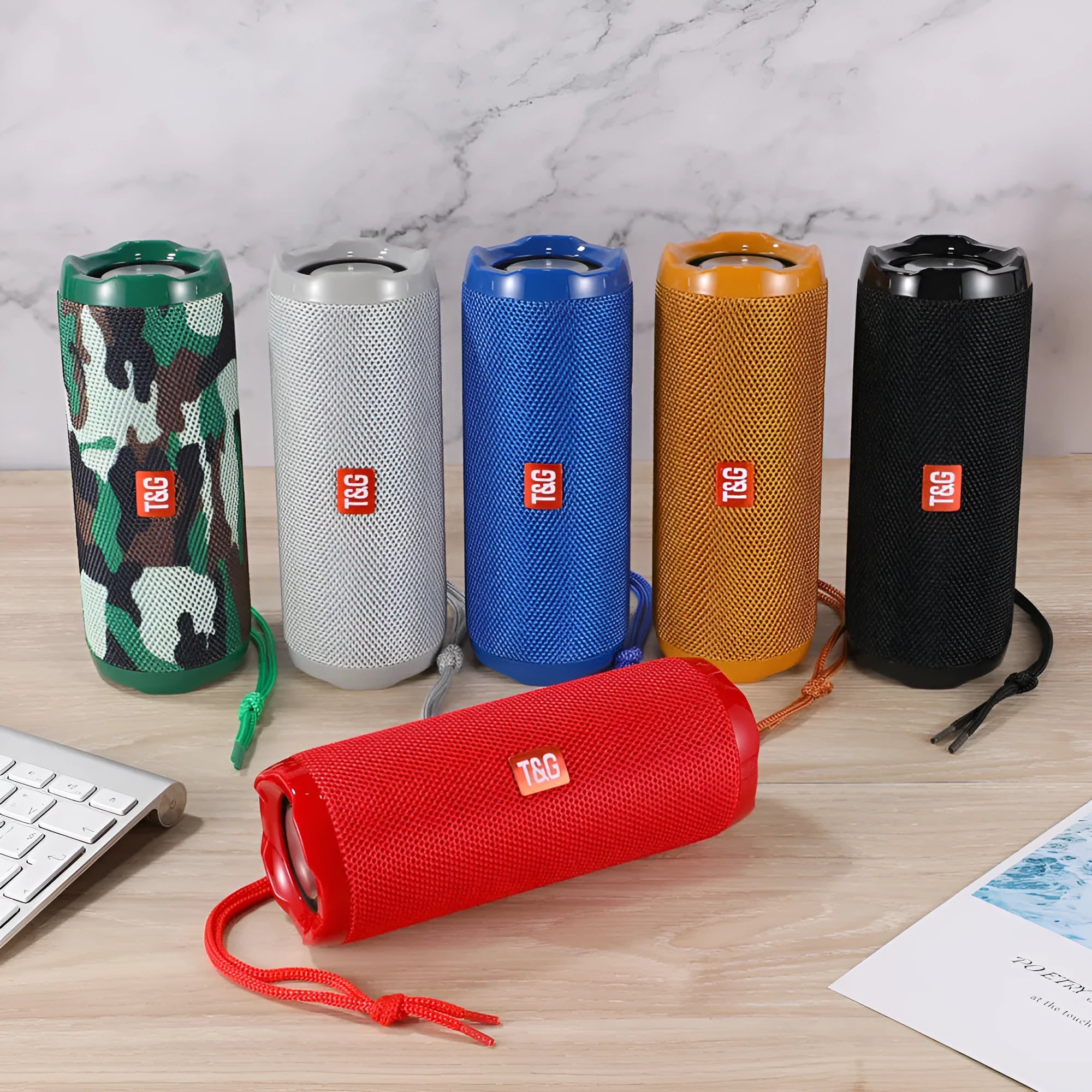 A rectangular portable Bluetooth speaker in multiple colours with a visible card slot on its side.