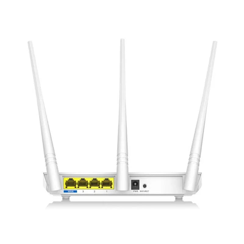 White dual-band wireless broadband router with UK-style three-pin plug on a wooden desk.