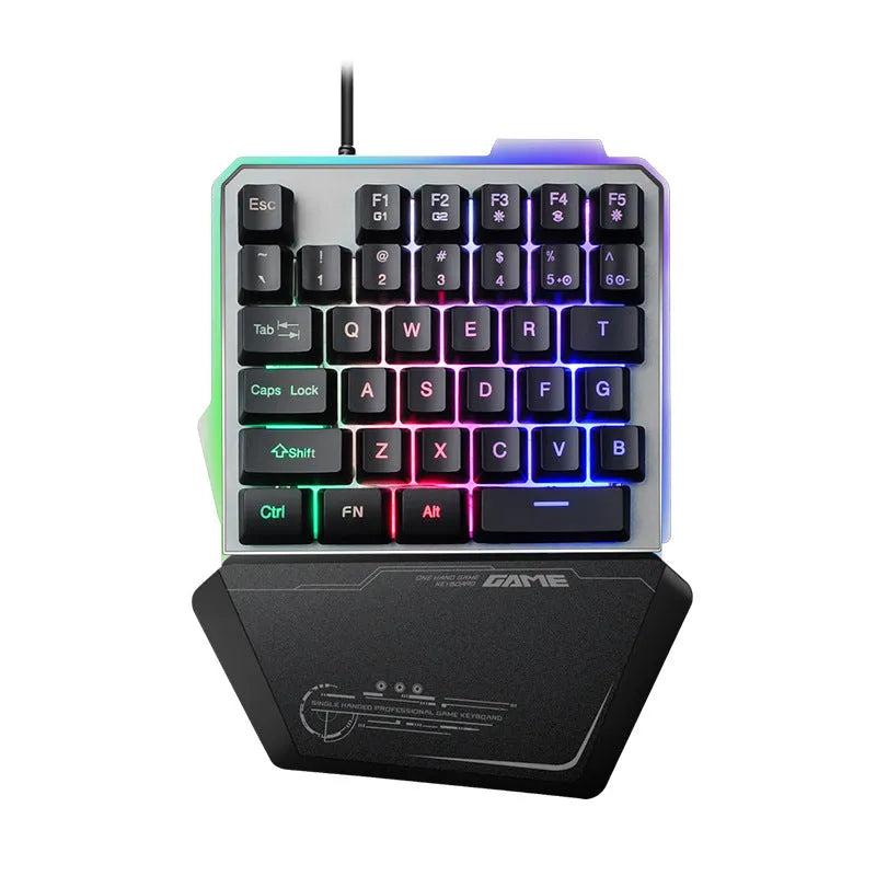 G40 Flow black one-handed mechanical keyboard with RGB backlit keys on a desk