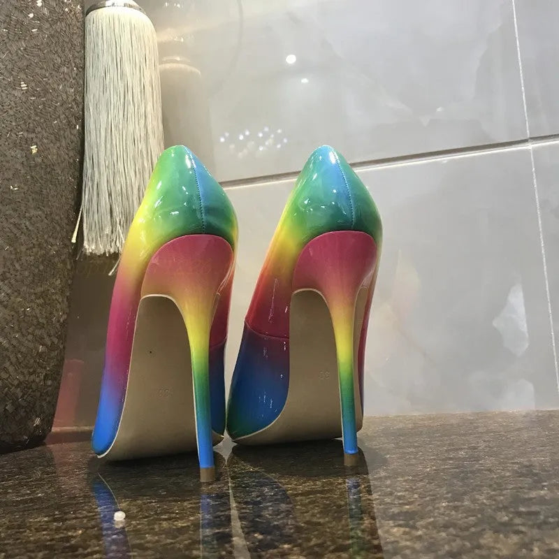 Rainbow patent leather women's high heel shoes with pointed toe and thin heel.