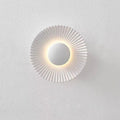 Round aluminium wall lamp with LED light in a choice of six colour finishes.