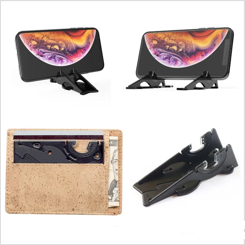 Plastic card type mobile phone holder in various colours on a desktop.