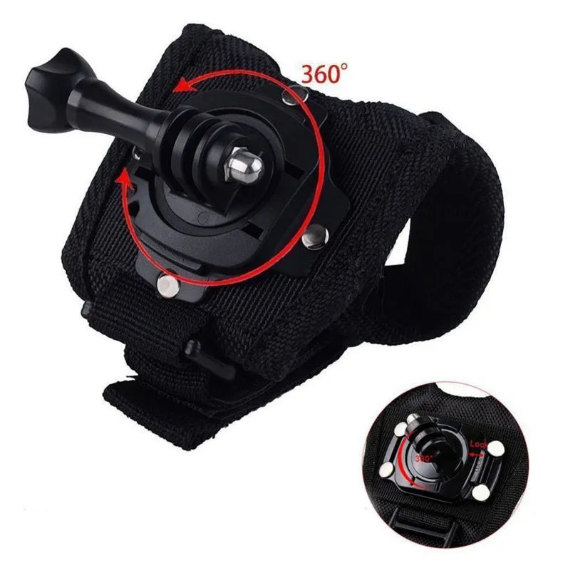 Black GoPro wrist strap with 360-degree rotating camera mount on a palm