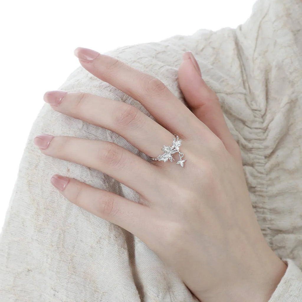 Women's silver butterfly ring with adjustable opening in gold-toned finish