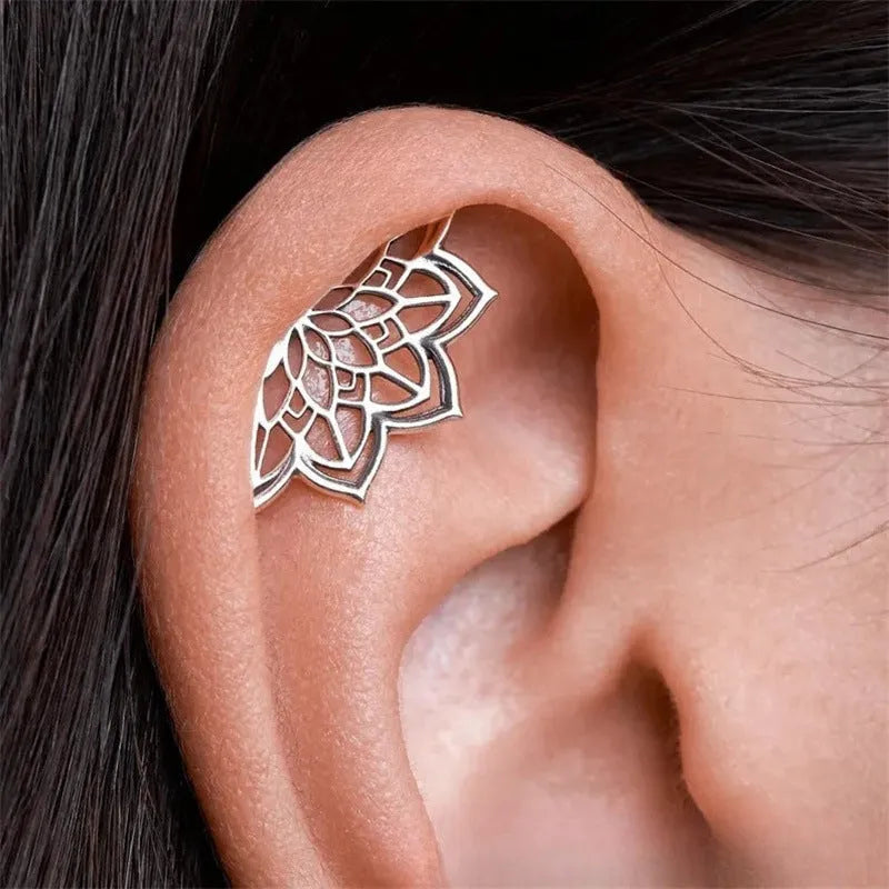 Geometric spider web metal stud earrings with electroplated gold and silver finish options