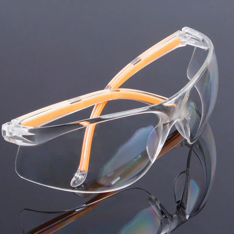 Transparent labour protection safety goggles with yellow frame for industrial and laboratory eye protection