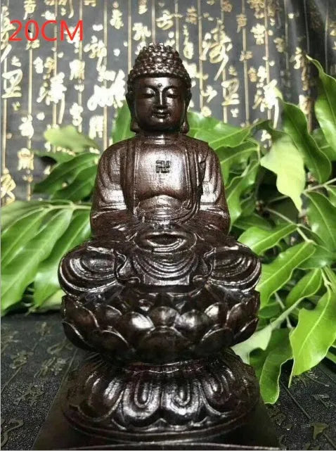 Hand-carved Sakyamuni Buddha statue in natural black wood, 30cm tall, for home or office display