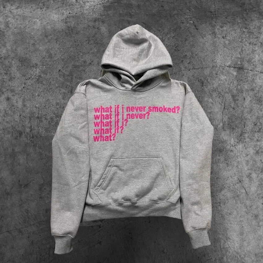 Black heavy hooded sweater with white letter print on chest, shown on a model.