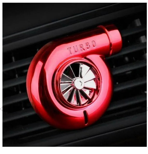 Spinning turbo air freshener clipped to car vent with ocean fragrance ABS plastic black colour
