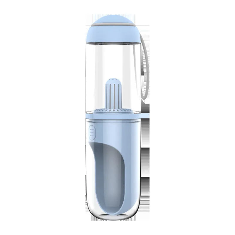 Blue pet travel cup 330ml with filter element next to a dog on a walk