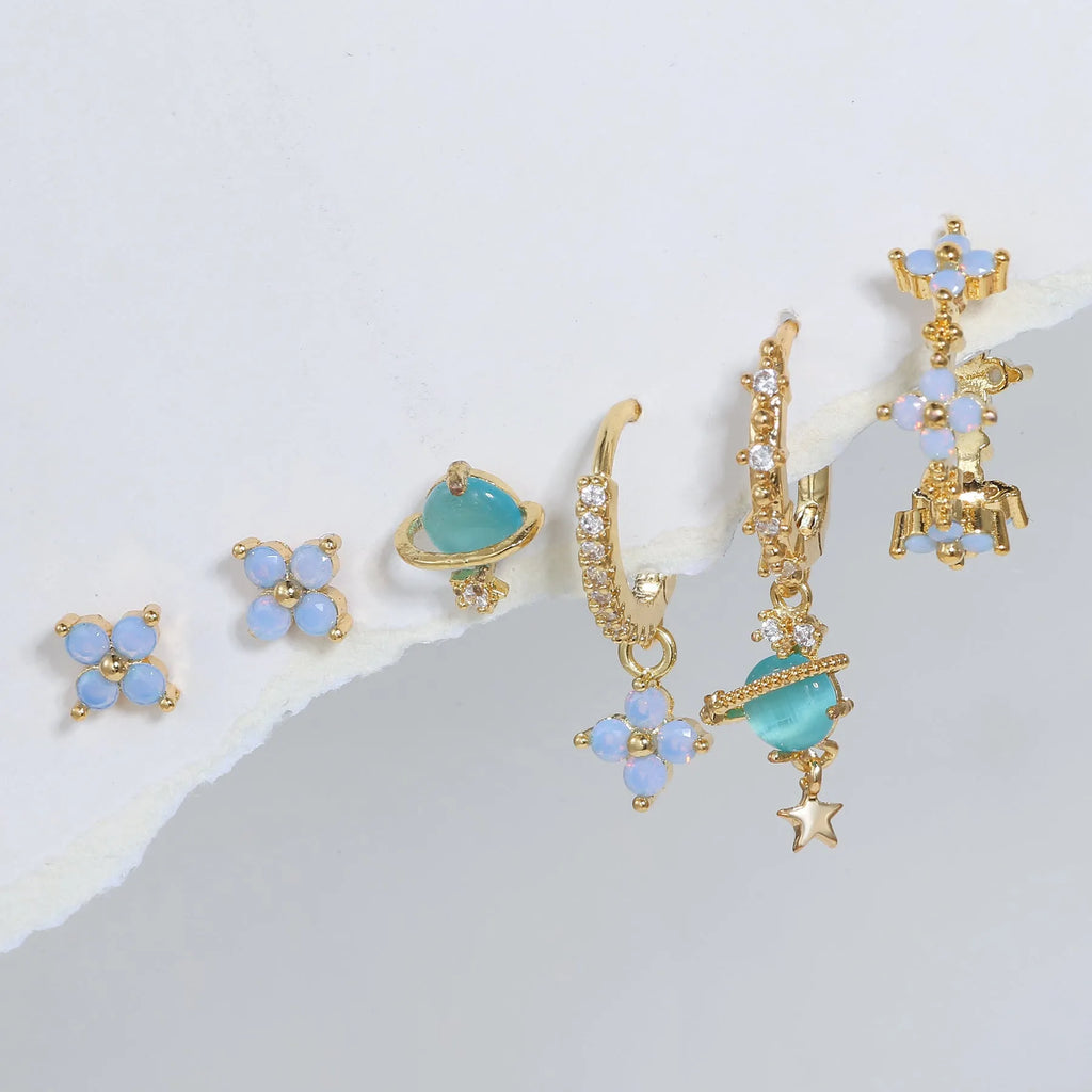 Gold and silver blue floral stud earrings with zircon mosaic on copper.