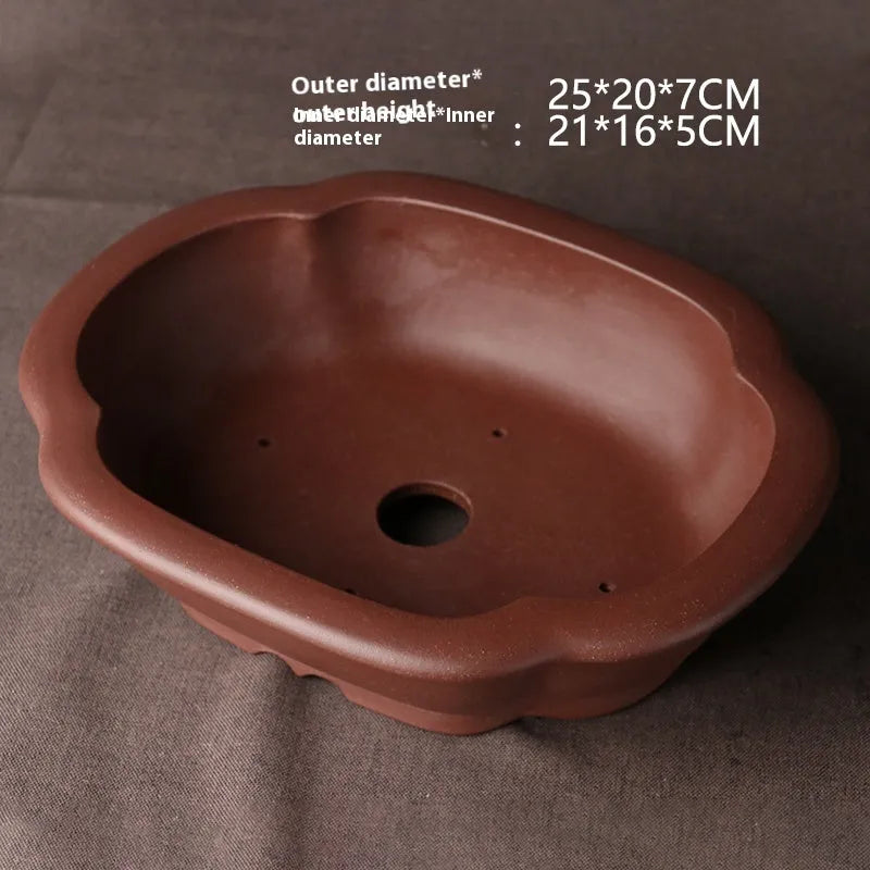 Handmade purple clay Chinese style bonsai pot measuring 25 cm long by 20 cm wide.