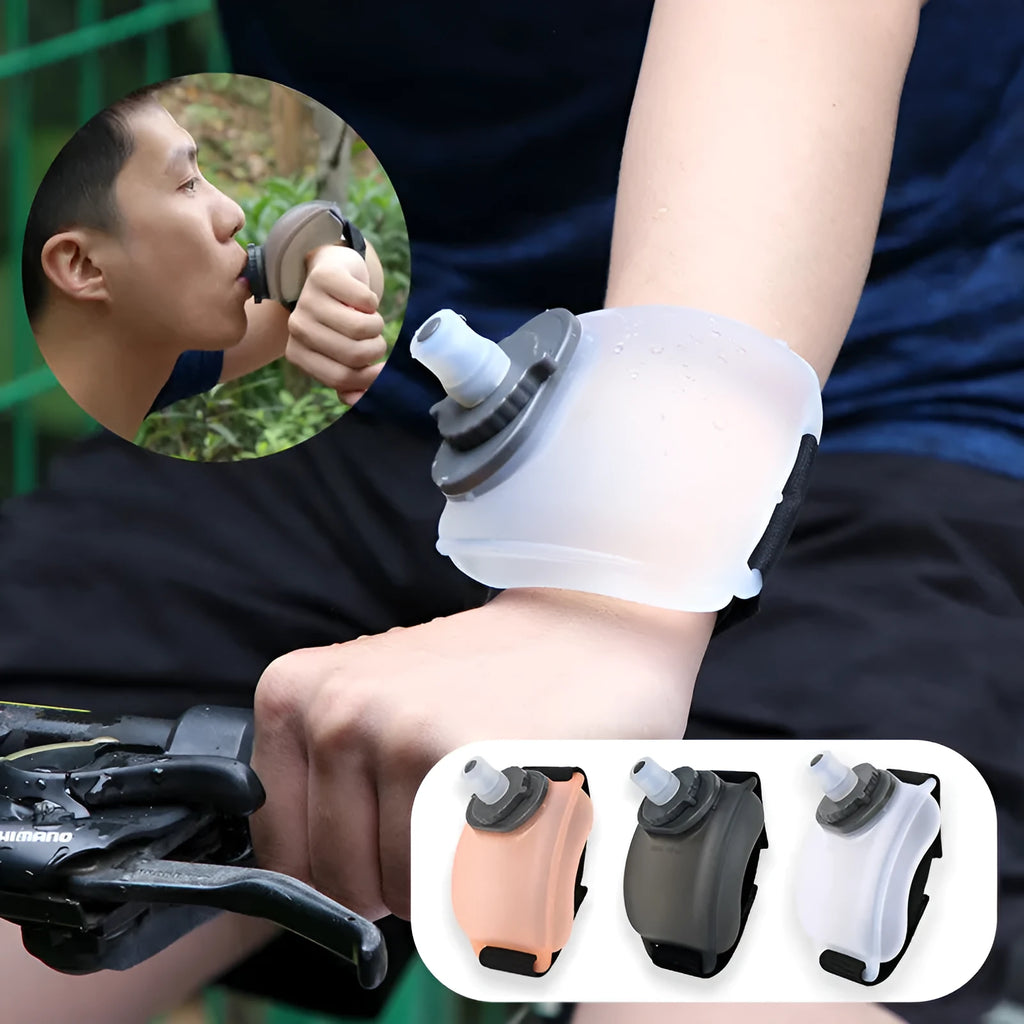Orange wrist water bottle with Velcro strap and bite valve, shown mounted on wrist for running or cycling