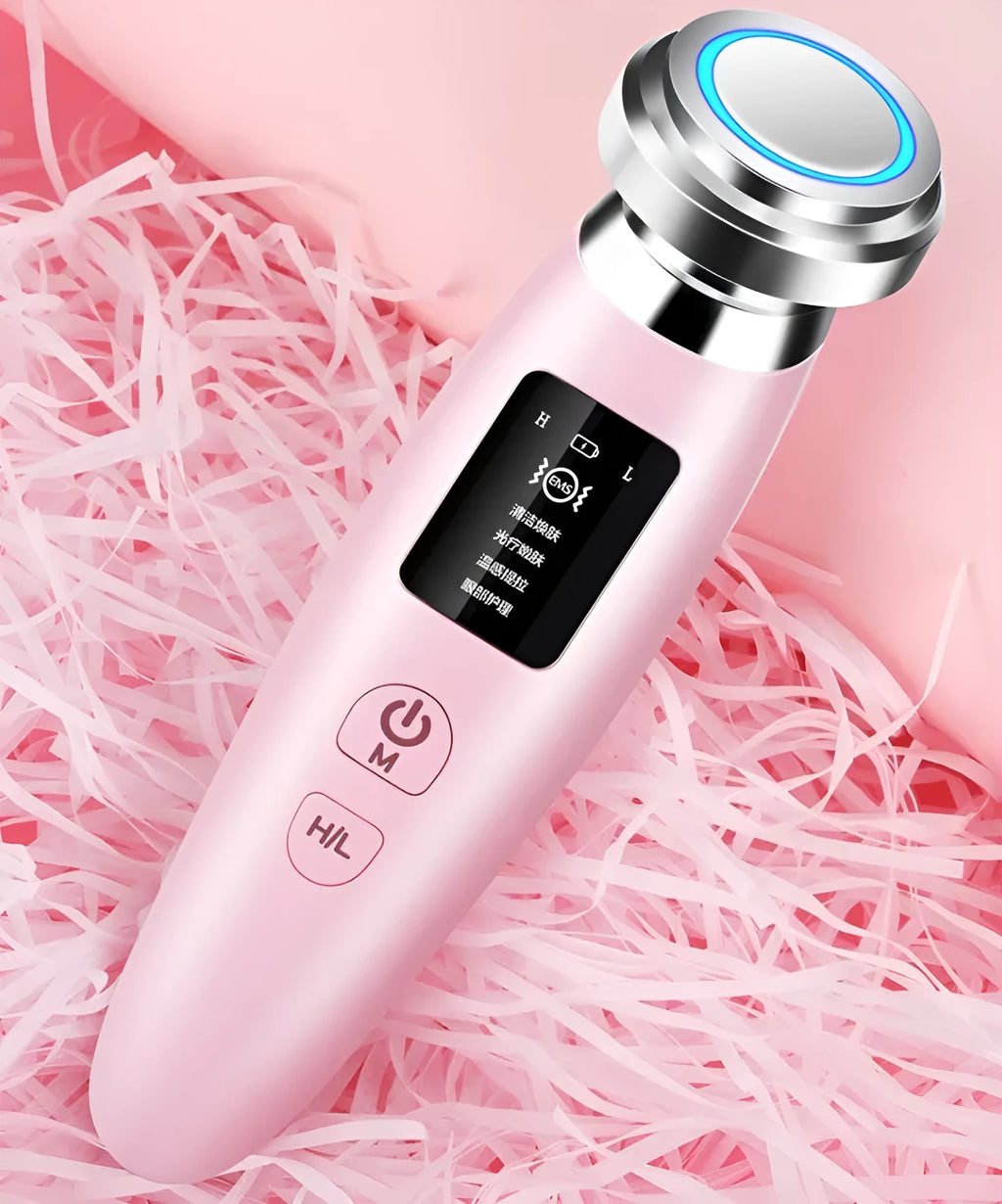 Pink portable skin rejuvenation and facial cleansing beauty instrument showing its compact size.