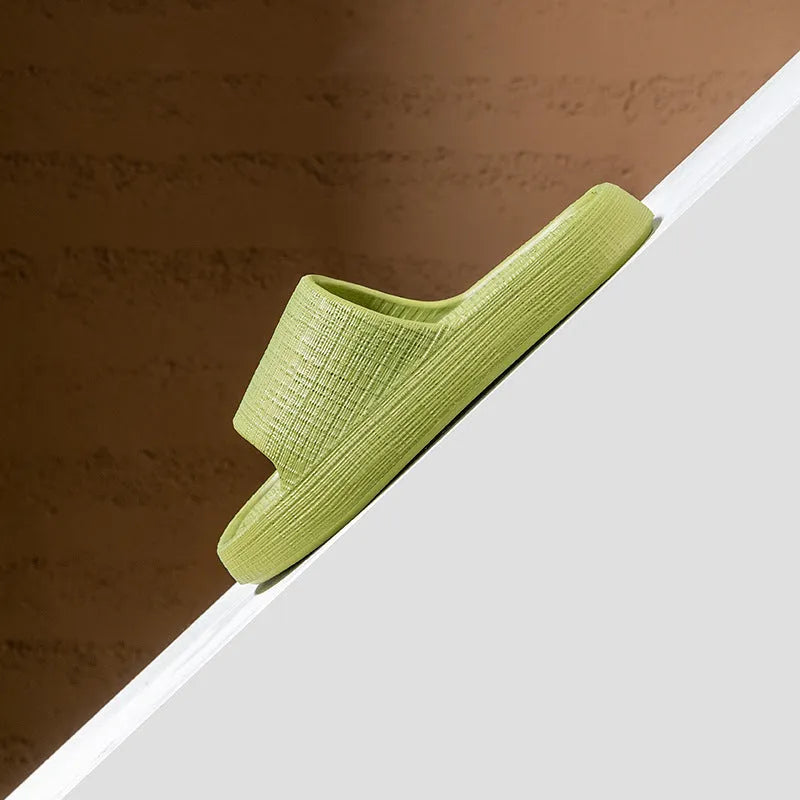 Pair of soft bottom toe ring slippers with non-slip EVA soles in a choice of five colours.