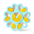 Flower-shaped blue dog puzzle slow feeder bowl with multiple food compartments on non-slip base