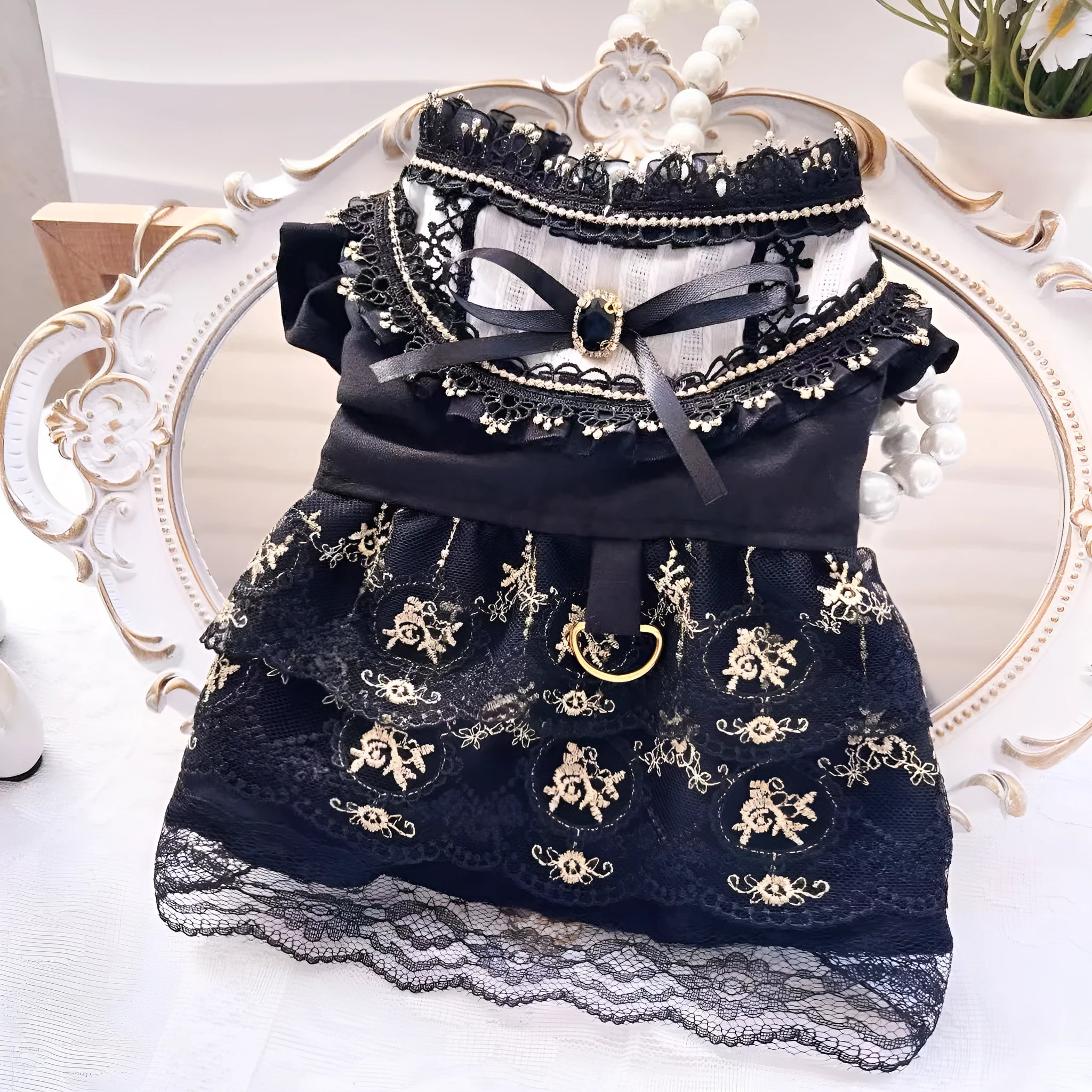 Golden gothic-style flared skirt for a small dog or cat on a white background.