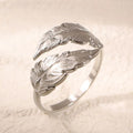 Adjustable stainless steel feather ring with electroplated silver or gold finish