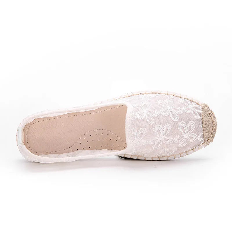 Women's flat linen fisherman shoes in white with a round toe and rubber sole.