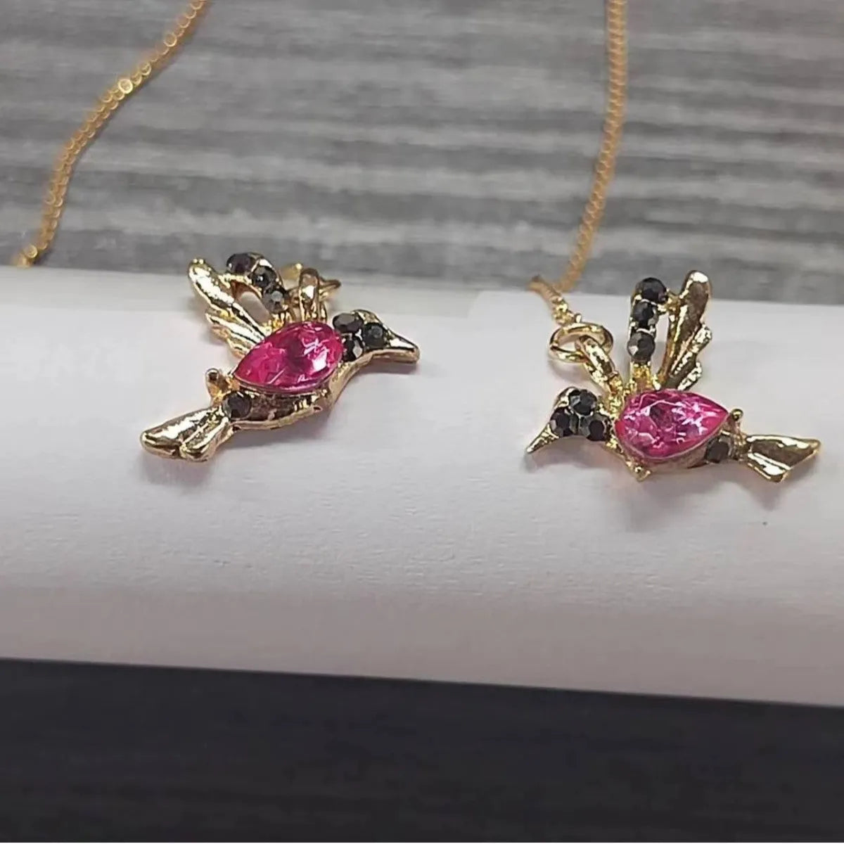 Bird hanging long style earrings with mixed zirconium wing design in alloy construction
