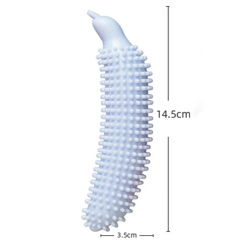 Green cucumber-shaped dog chew toy with a squeaker on a white background