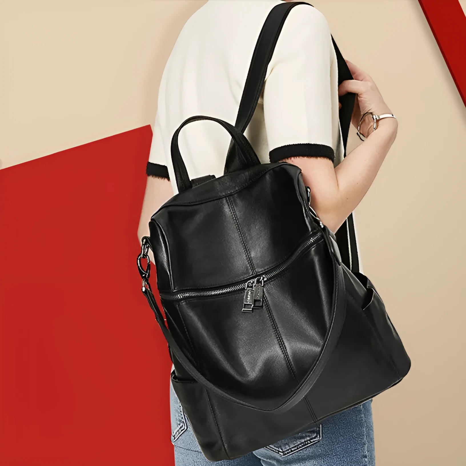 Genuine leather retro-style women's backpack showing front sandwich pocket and brown leather texture.
