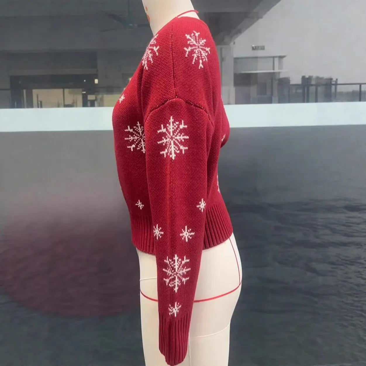 Women's red snowflake jacquard boat neck pullover Christmas sweater with crocheted flowers