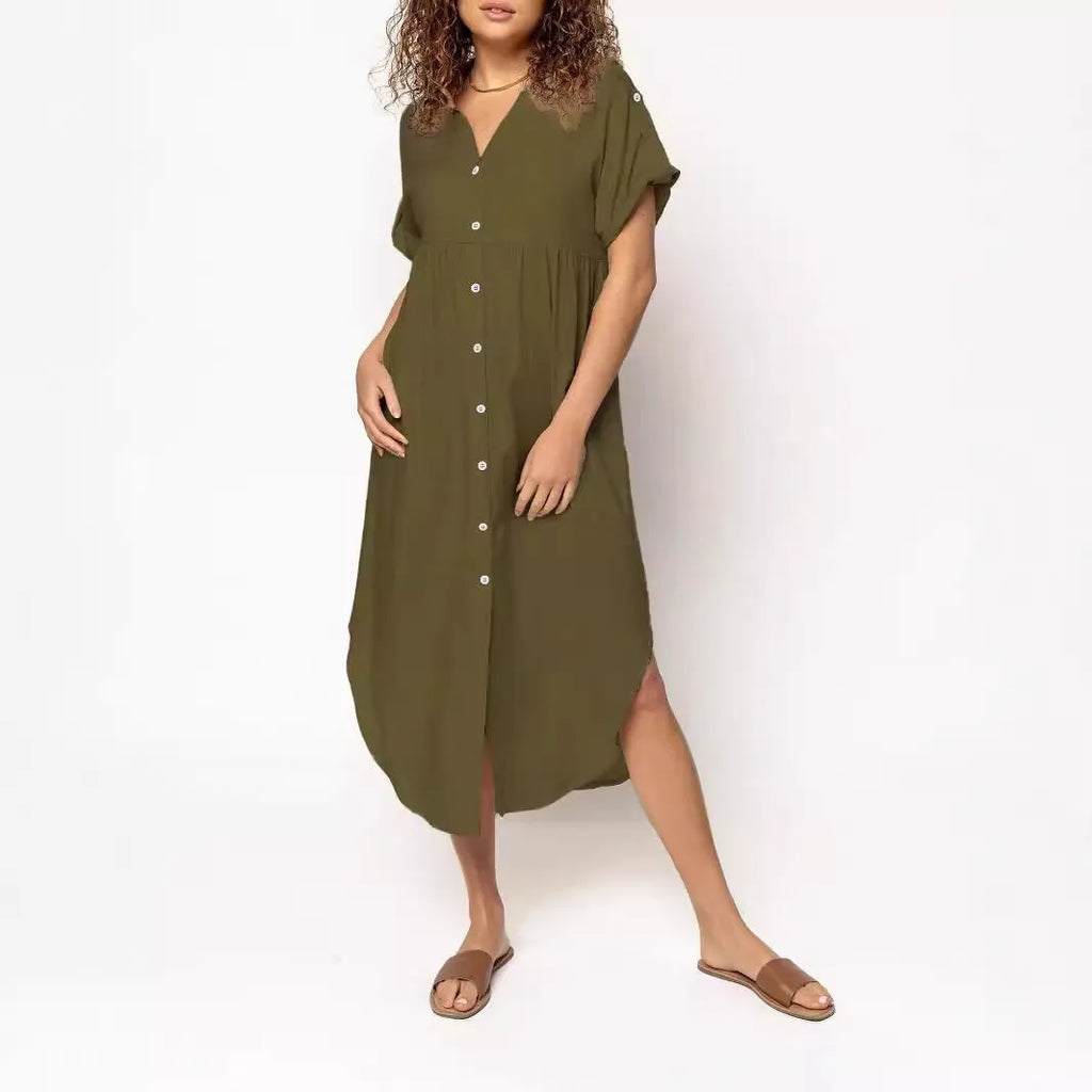 A loose-fitting mid-length casual dress with a button-down front, shown in a solid colour.
