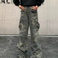 Men's loose-fit camouflage cargo trousers with multiple pockets on a washed cotton-polyester fabric.