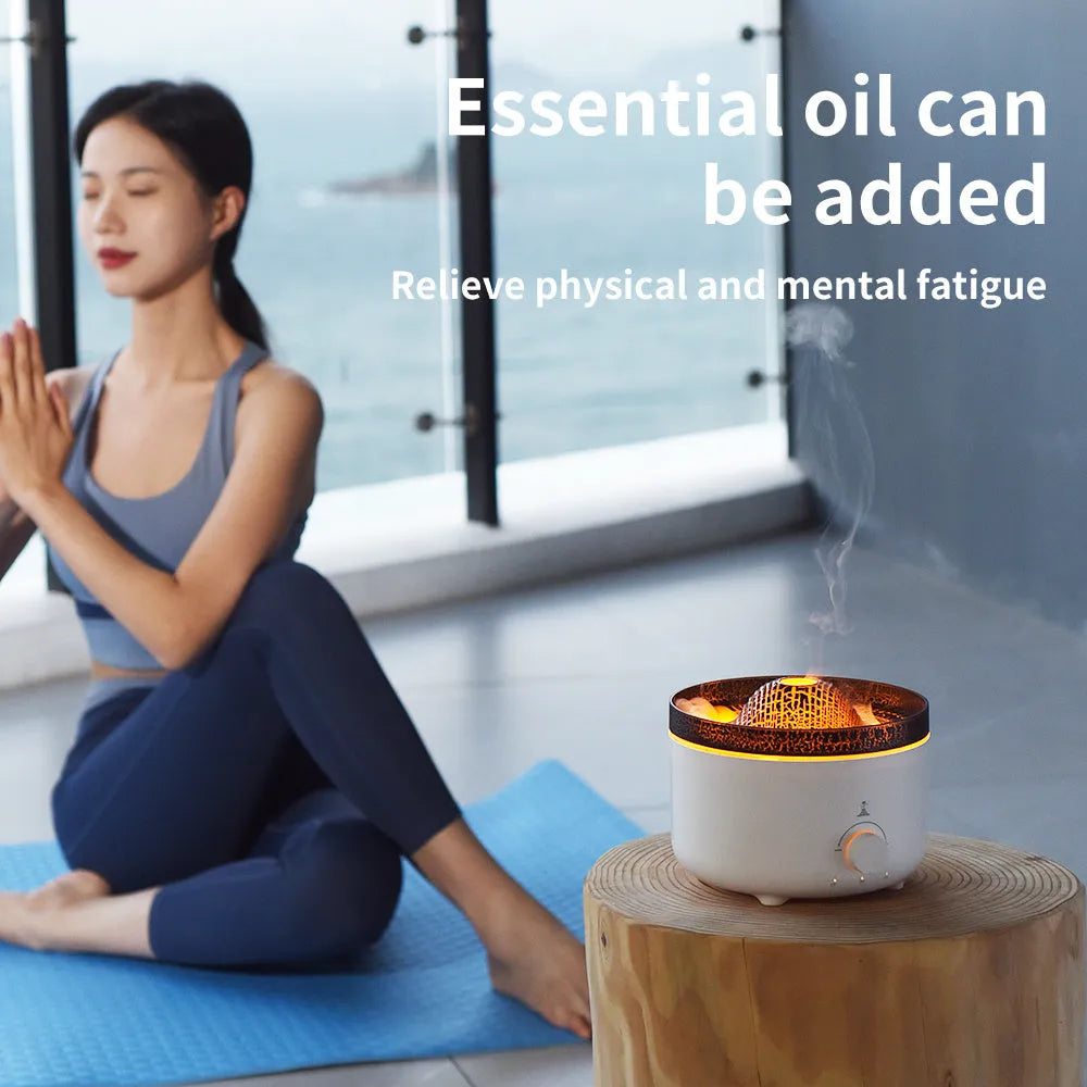 White simulated flame volcano humidifier with remote control showing orange and blue lighting effects