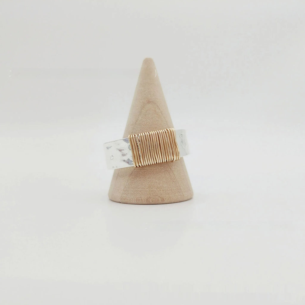 Copper geometric ring with silver golden electroplated finish and irregular vintage coil design.