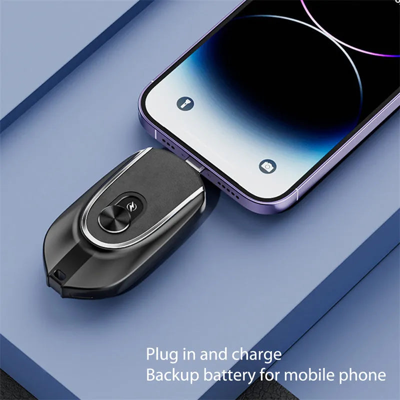 Black mini keychain power bank with Type-C and iPhone outputs, 1200mAh, hanging buckle, 71 x 19.5 x 38mm
