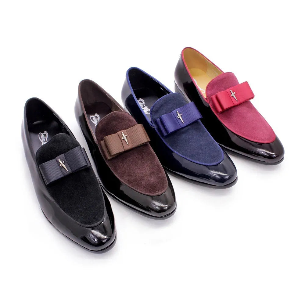 Men's glossy black patent leather low-top shoes with a tassel detail on a white background