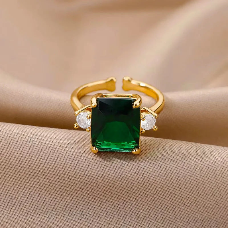 Green zircon flower ring with adjustable open-mouth stainless steel band, sizes 6 to 8, retro geometric design