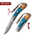 VG10 folding mini outdoor knife showing stainless steel blade and dovetail pattern in blue or red