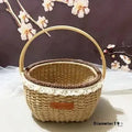 Hand-woven straw basket with hemp rope detail in coffee brown colour.