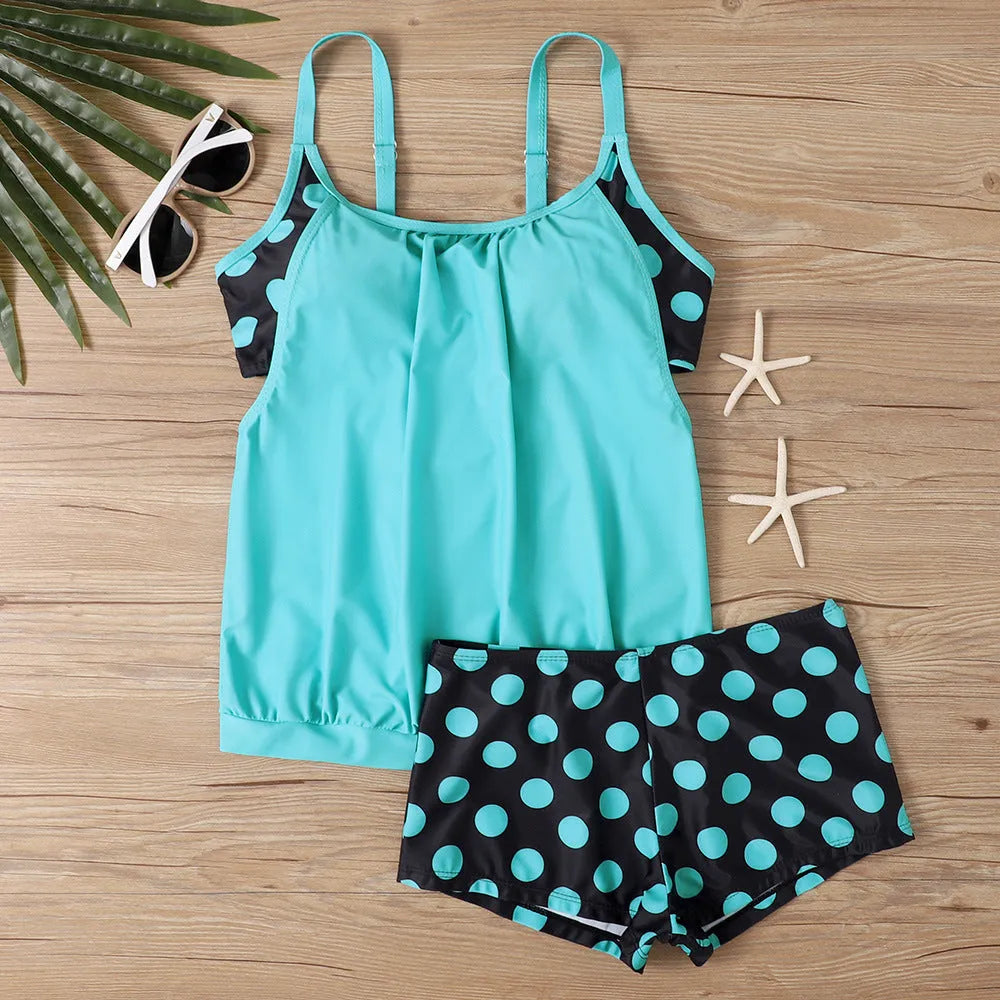 Women's high-waist polka dot boxer swimsuit brief in polyester fabric for swimming and sports.