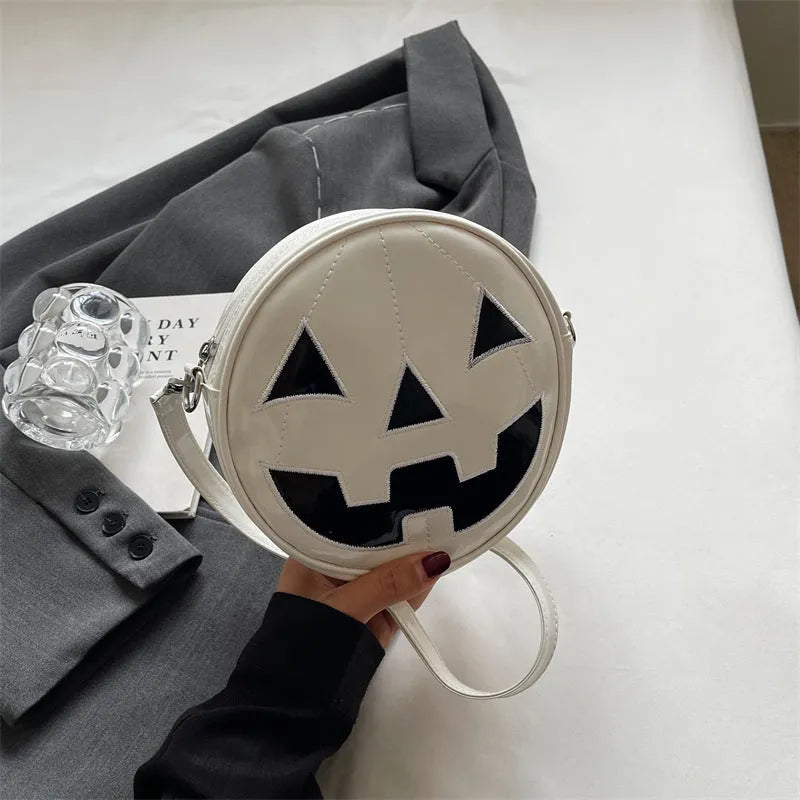 Small round pumpkin crossbody bag in PU, 18 x 18 x 7cm, shown in orange, black, and white