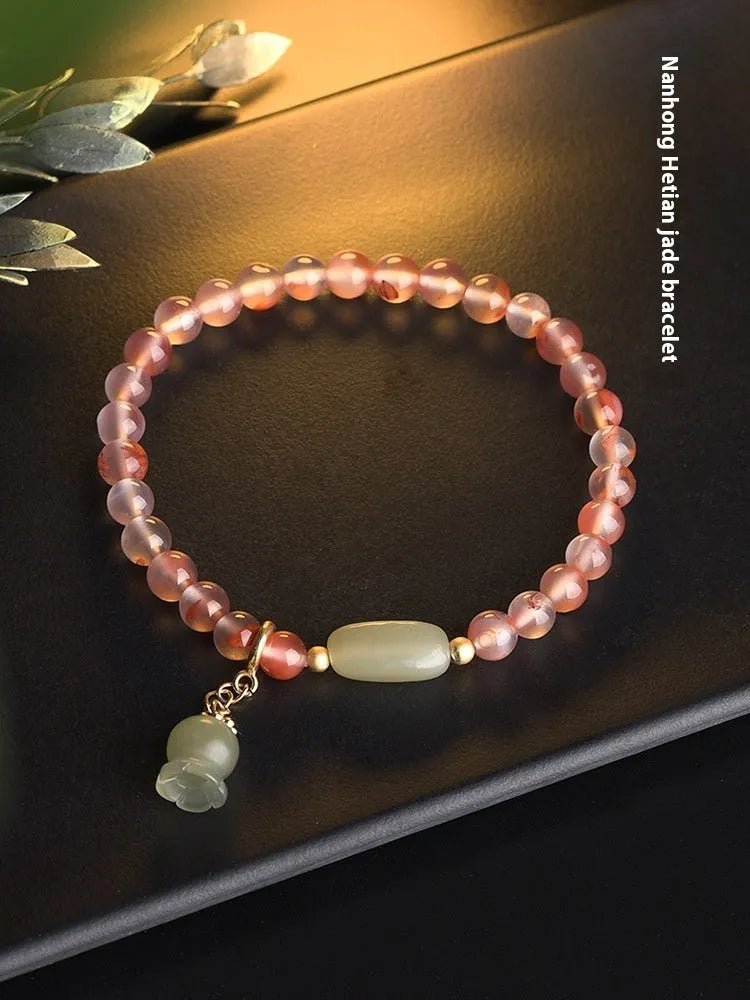 Agate bracelet with flower design and bamboo joint elements featuring Nanhong ice float gemstone