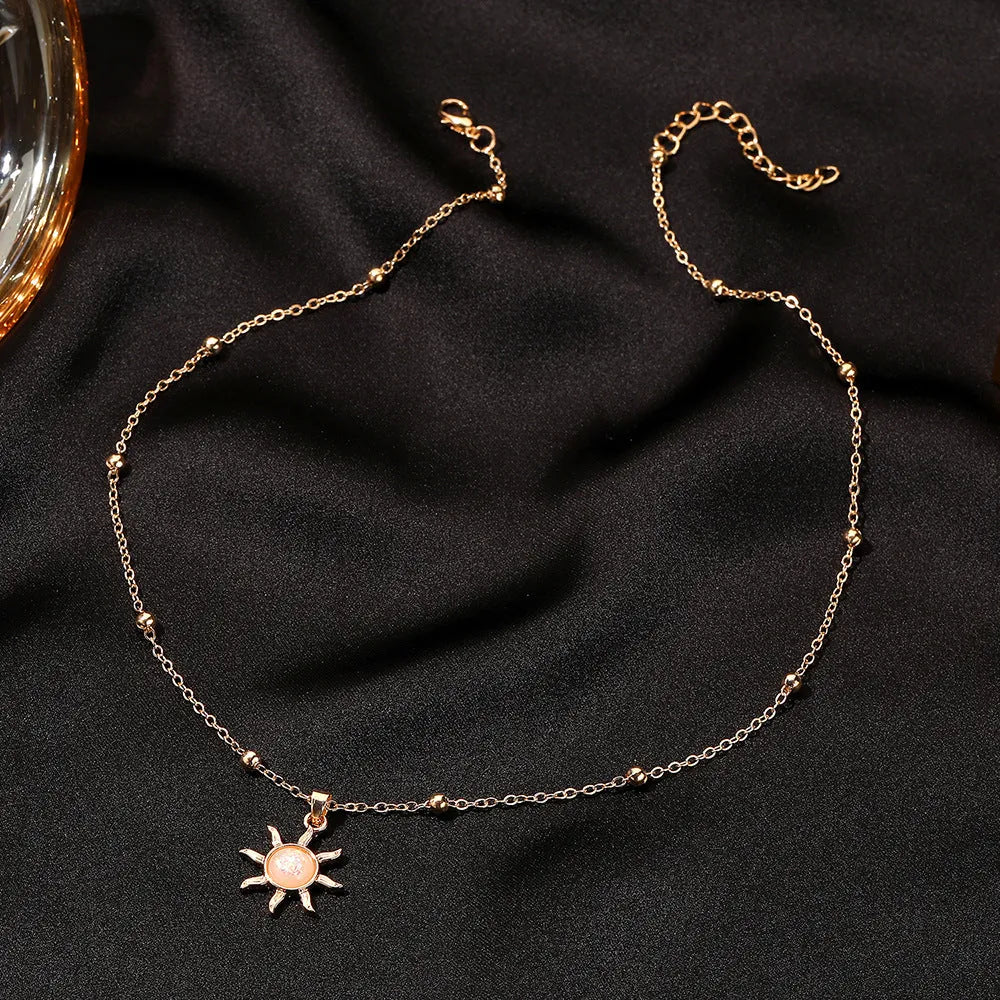 Alloy clavicle necklace with inlaid opal flower pendant on cross chain, gold or silver finish